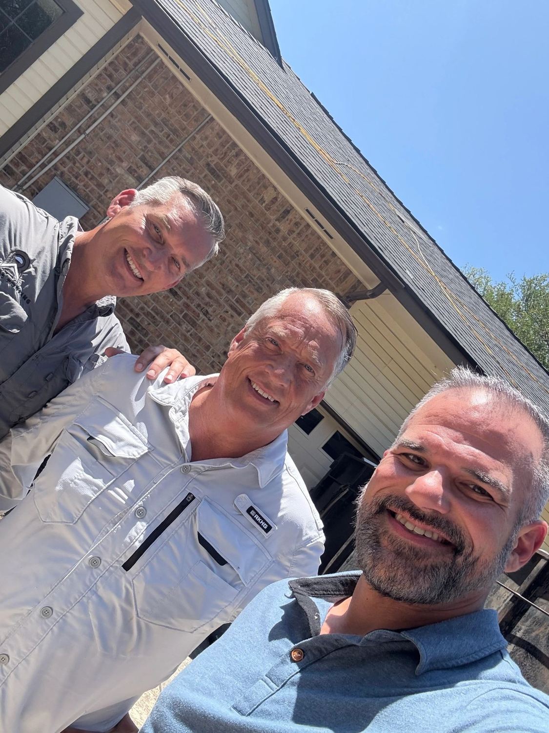 Jay, Mark and Justin Burrage on a job site