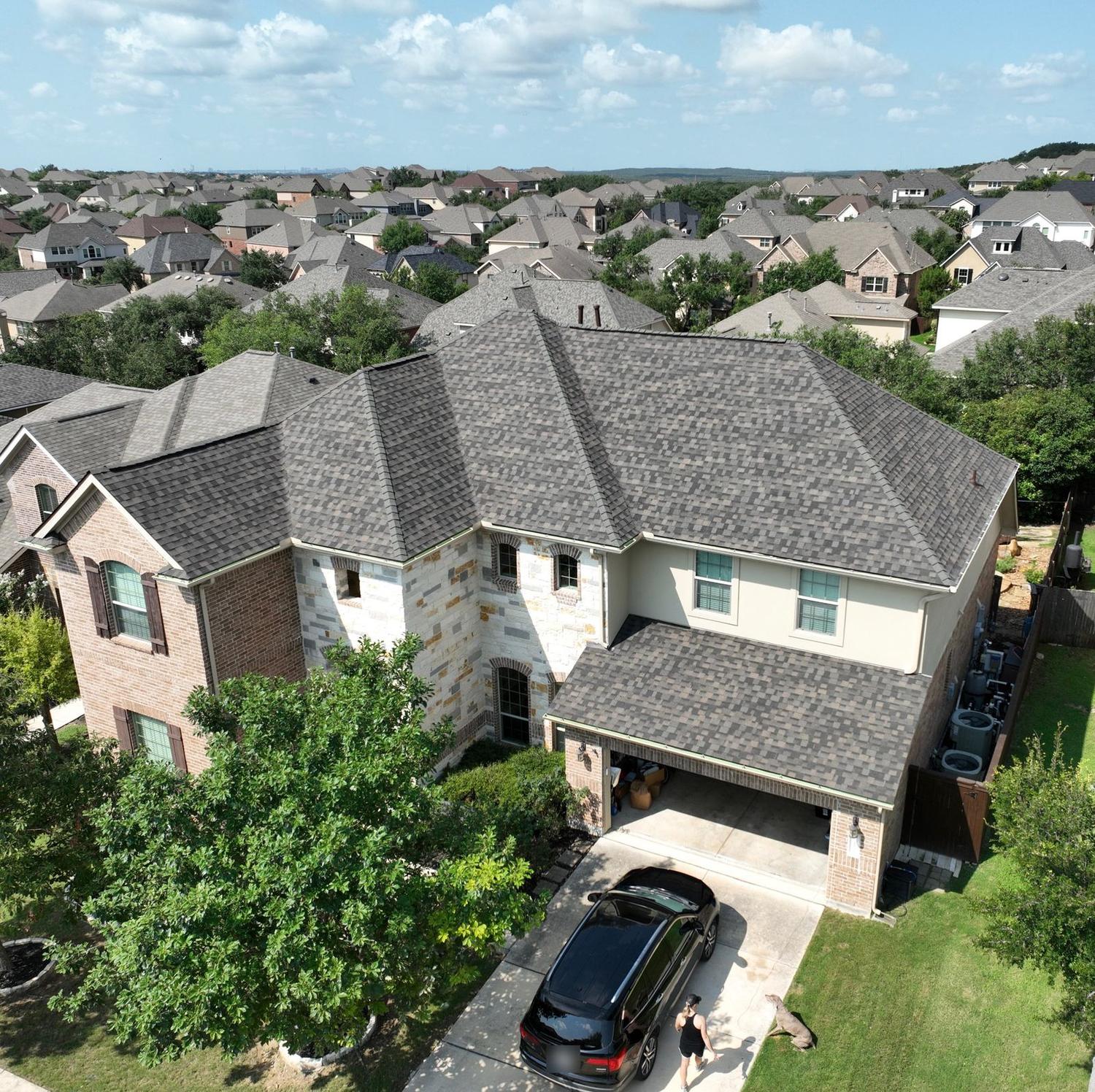 Aerial view of a new shingle roof by Burrage Roofing