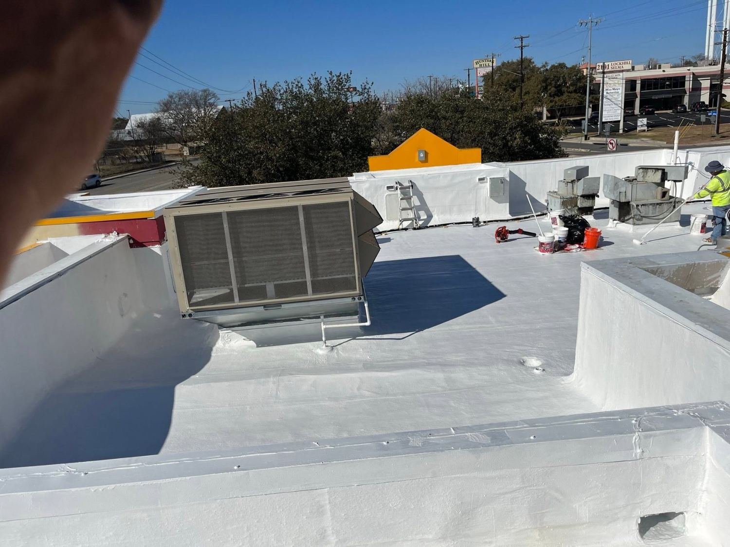 Commercial coating around rooftop unit