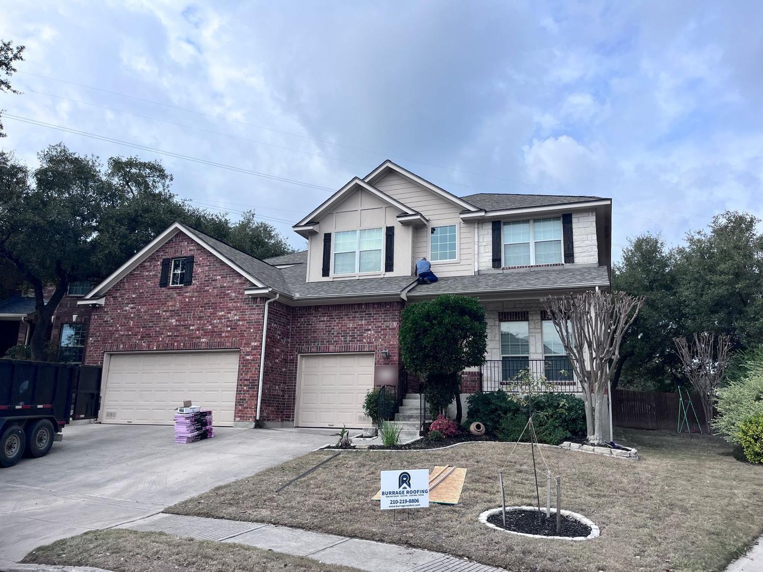 Burrage Roofing inspecting a home's roof