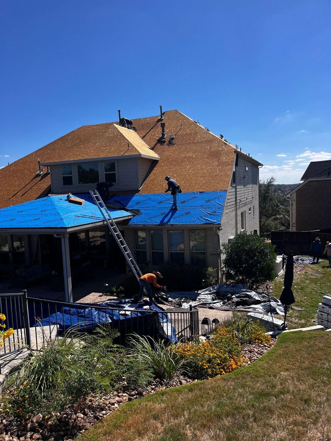 Roof tear-off in progress